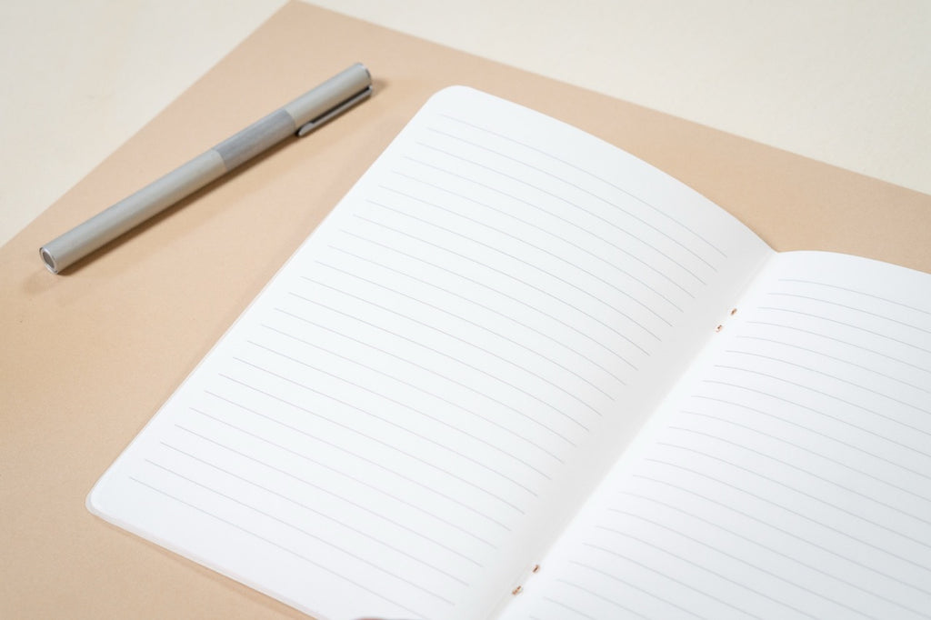 Cahier ligné - Les essentiels